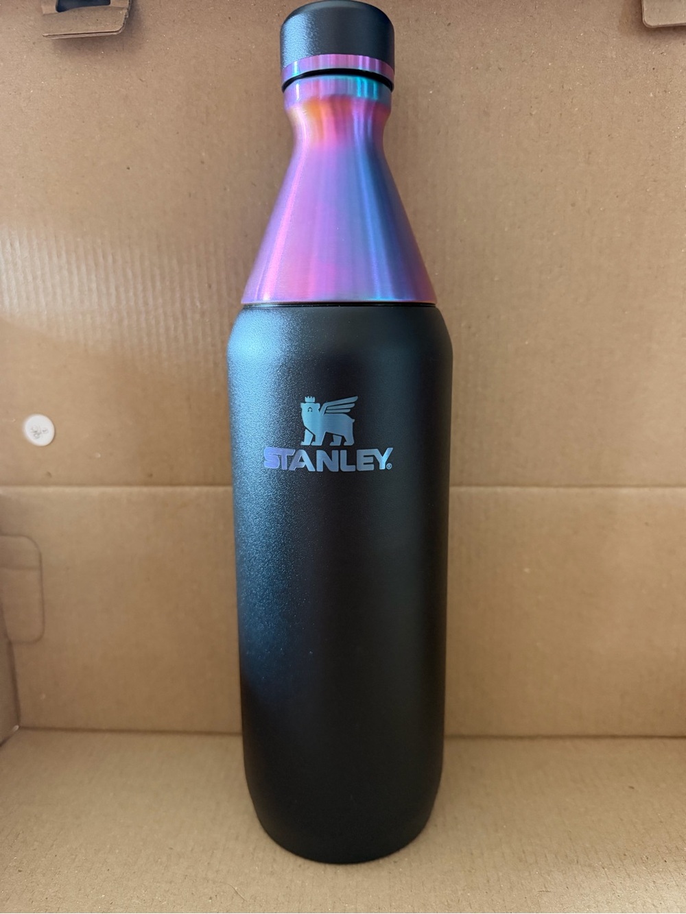 New- never used Stanley chroma Black Bottle with Iridescent Purple-Pink Neck